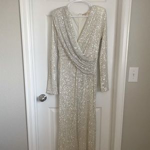 Never worn ‘Here for the Party’ sequin jumpsuit from Bella and Bloom.